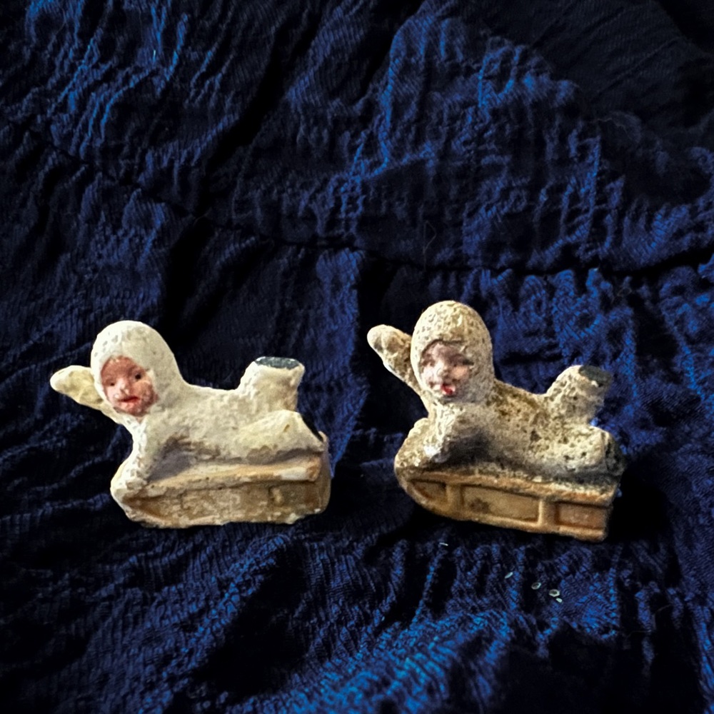 Set of Two Vintage Bisque Snow Babies on Sleds